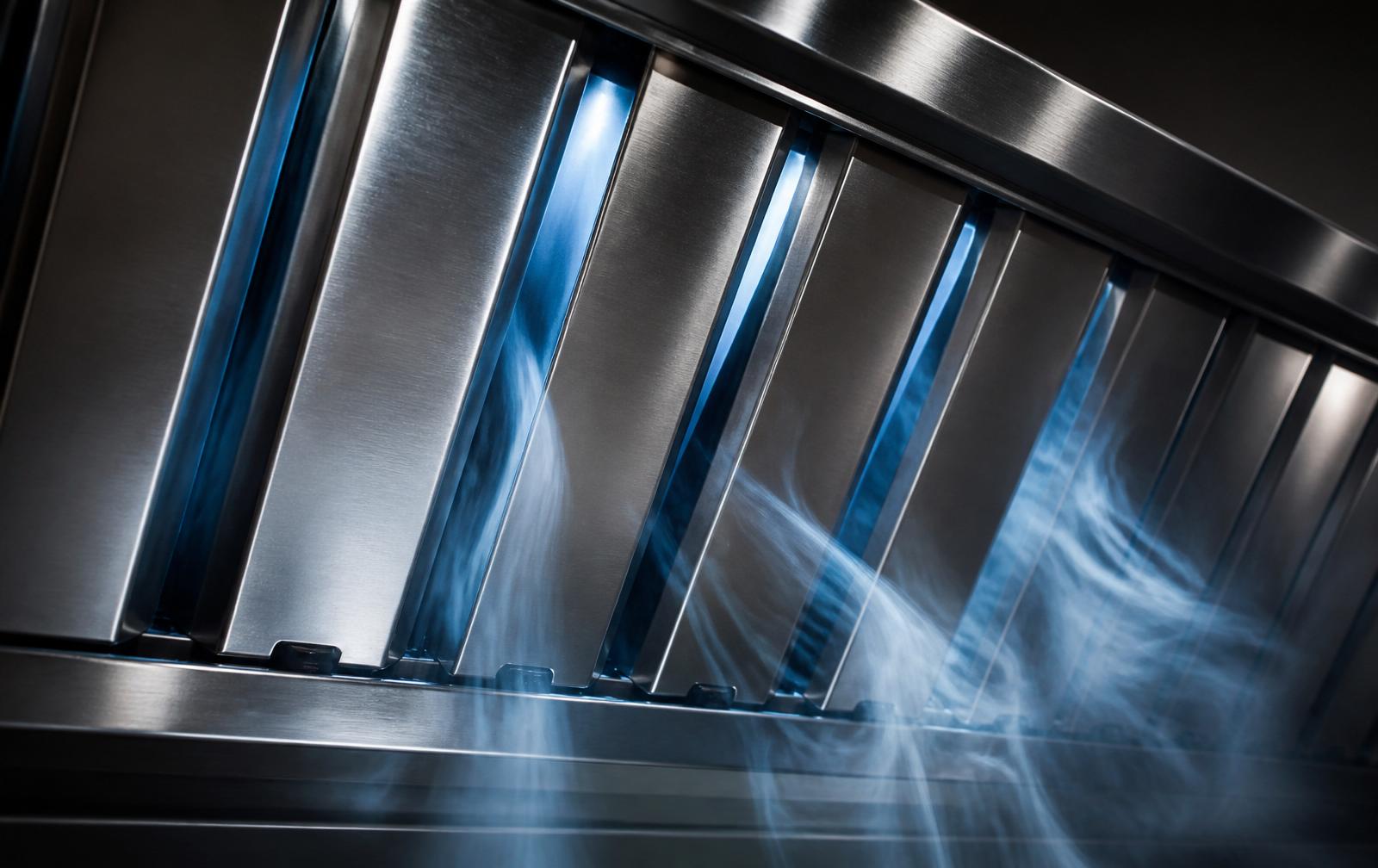 Macro of brushed stainless baffle filters with airflow glow